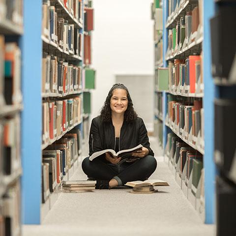 Psych major Natalie Castillo sits in library